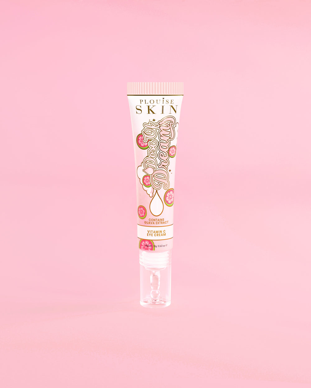 Tube P. Louise Dose Of Dreams Vitamin C Brightening Eye Cream op een roze achtergrond