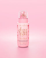 Flacone rosa di spray per capelli e corpo P.Louise 'Scent From Above' nella fragranza blush da spiaggia