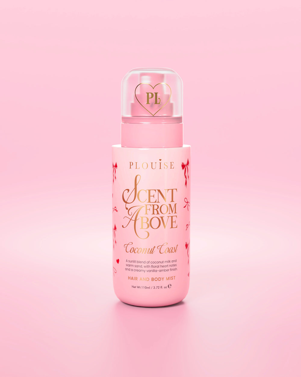 Bottiglia rosa di spray per capelli e corpo "Scent From Above" con grafica a fiocco rosso su sfondo rosa