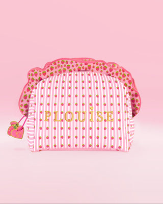 Pink and white striped P.Louise makeup and skincare bag with frills and strawberry graphics