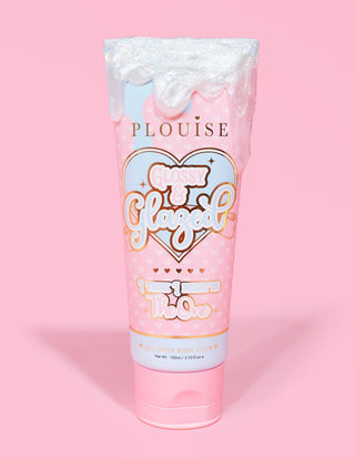 Pink tube of P. Louise Glossy & Glazed Body Glow with light blue and light pink text on it with silver body glow product dripping from the top on a pink background