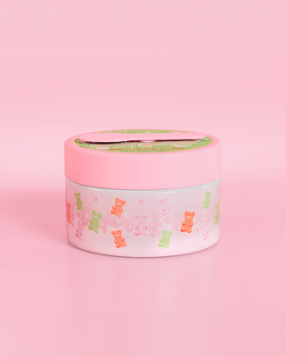 Tub of P. Louise Peel The Love Peel Off Face Mask in candy bear scent on a pink background